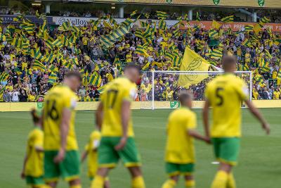 Norwich City Footballers walking onto the field at Carrow Road