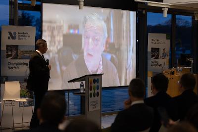 Stephen Fry on screen at the Extraordinary Norfolk event